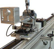 The lateral guide system consisting of Rexroth LF 20 S linear guides and support stations.
